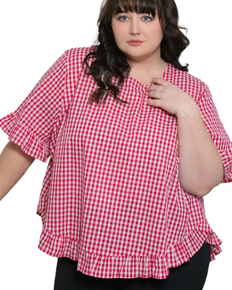 Front of a model wearing a size XL Dominique Blouse Gingham Frills Hi-Low in Red by ANNICK. | dia_product_style_image_id:282063